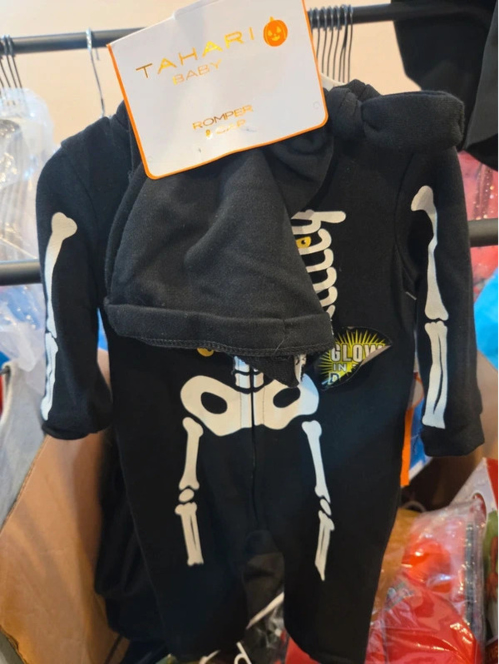 Glue on the dark baby costume